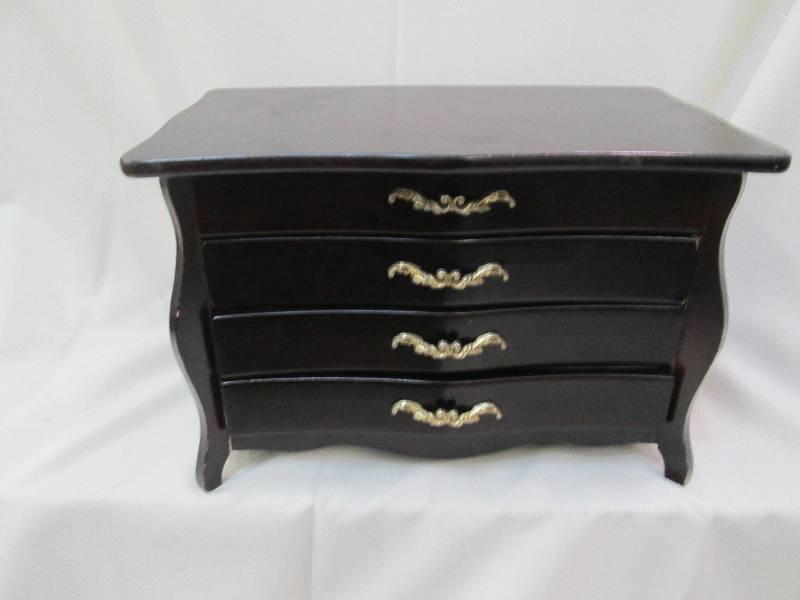 lot 54 image: Cherry colored jewelry box with 4 d...