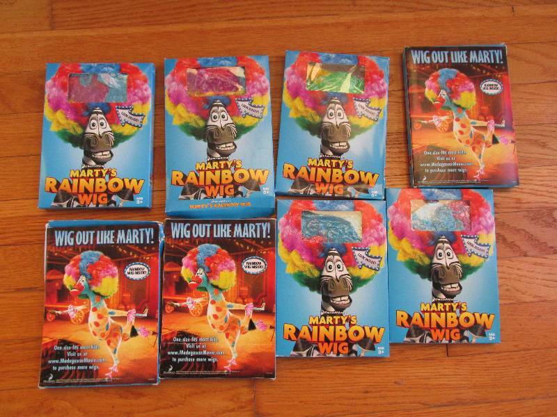 Martys Rainbow wigs, new in packag...