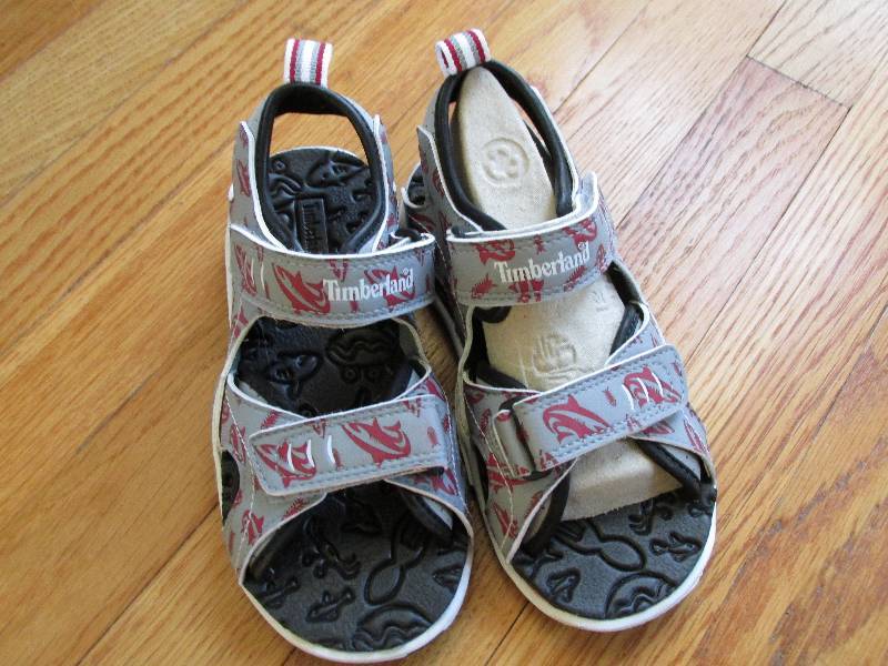 New size 13 kids Timberland shoes...