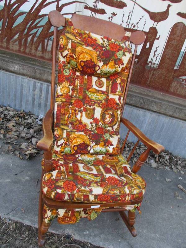 Rocking chair with pillows...