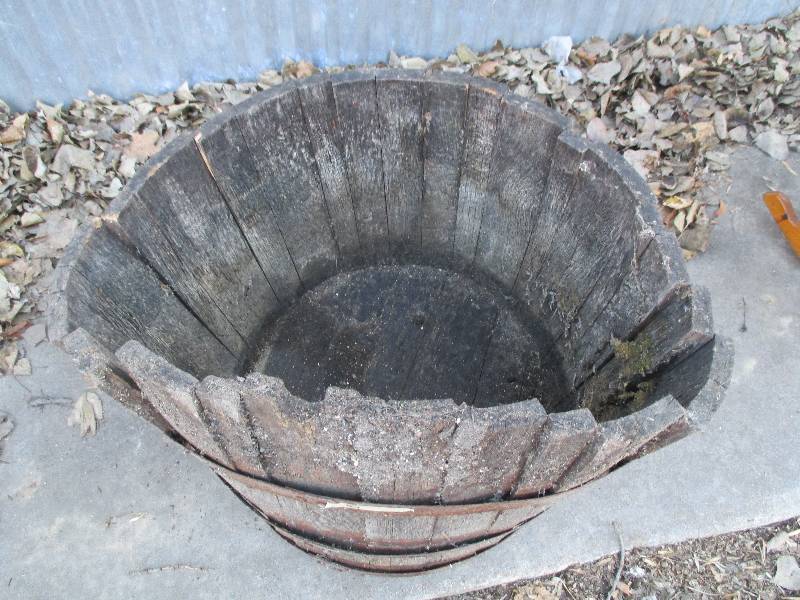 heavy wood and iron planter barrel,...