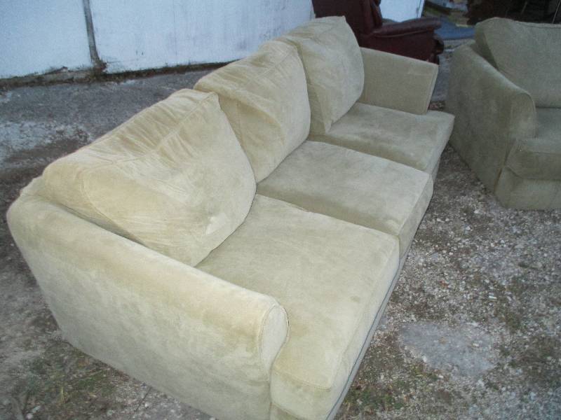 2 sage green couches, one 5 the ot...