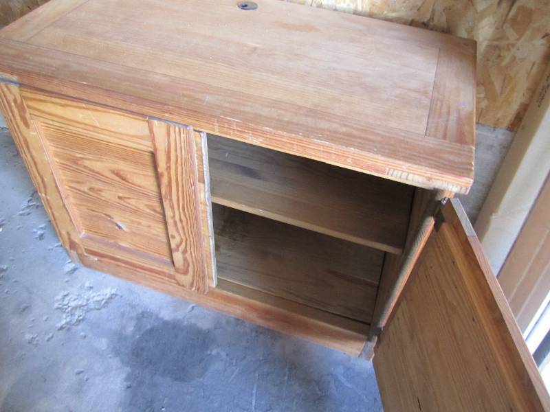All wood desk with cord hole in the...