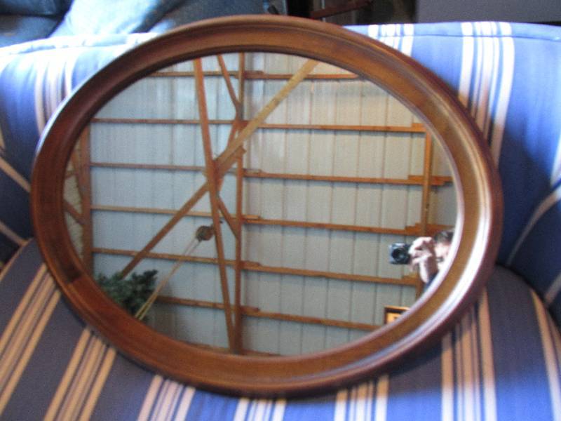 lot 44 image: Wood framed oval mirror, 27 x 34...