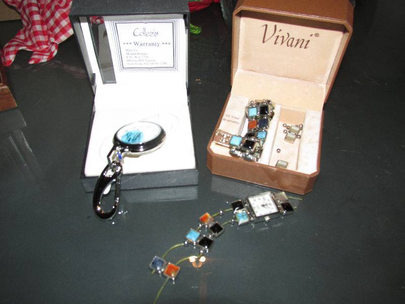 lot 115 image: New watch and watch with broken ban...