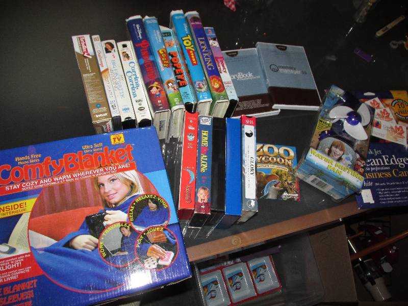 lot 119 image: Comfy blanket and lot of movies, gr...