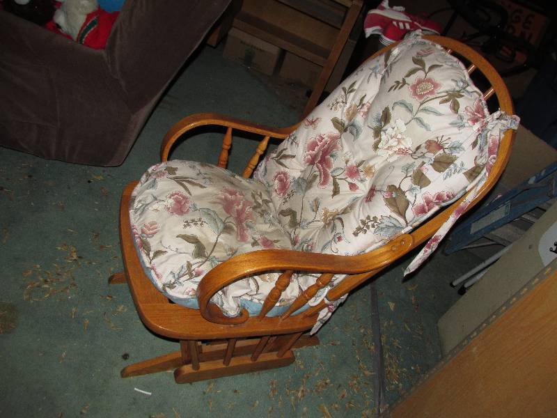 lot 131 image: Wood frame upholstered glider...