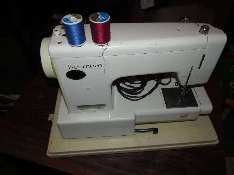 lot 105 image: Kenmore sewing machine on stand...