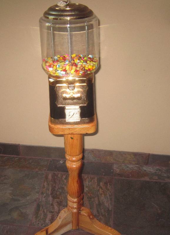 lot 4 image: Gumball Machine Floor Model works oak base