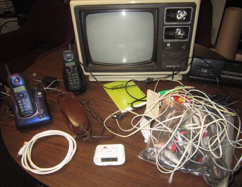 lot 50 image: LOT - Panasonic TV, Alarm Clocks, Phones, Wires, ETC