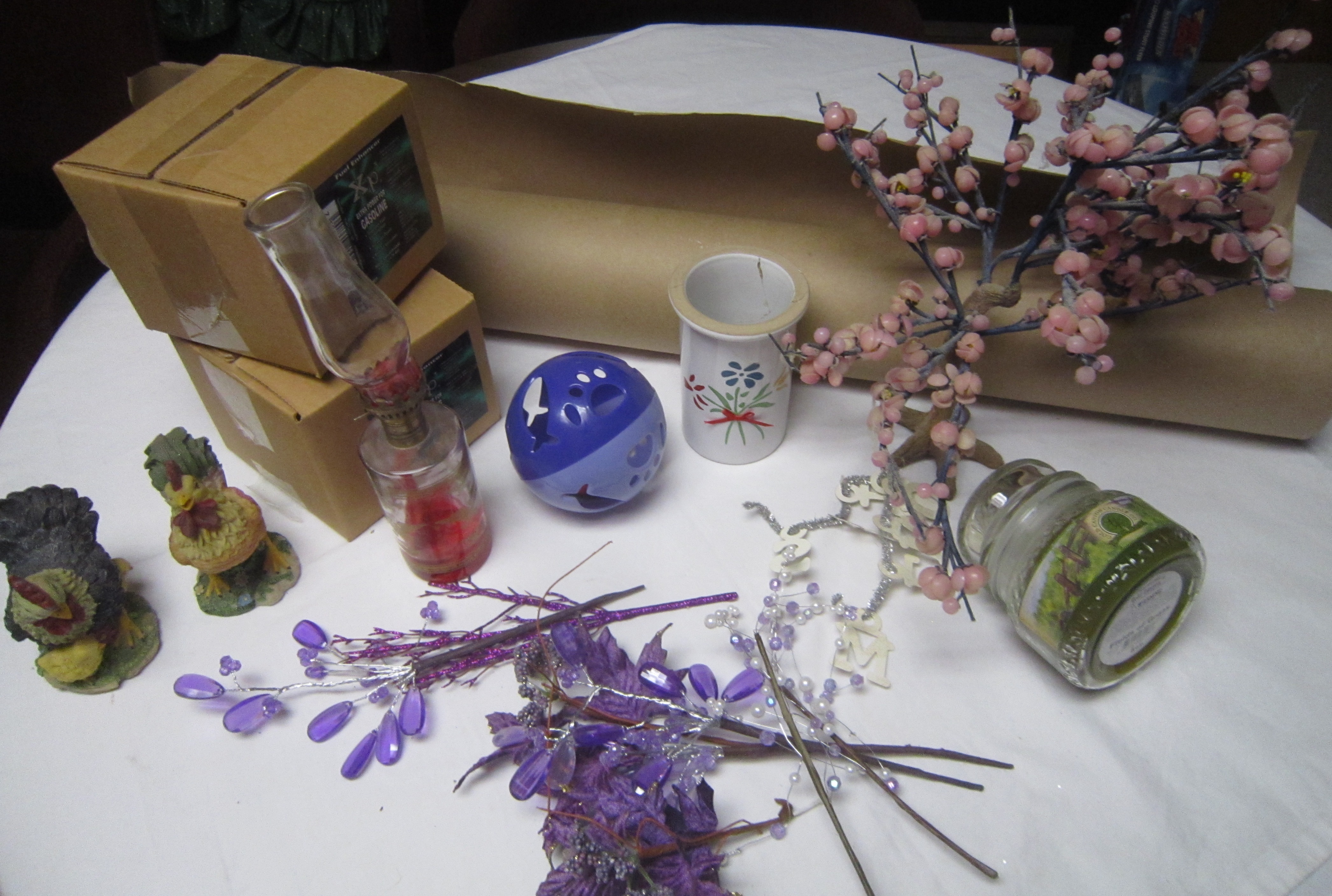 lot 86 image: LOT - Roll of Brown Paper, Oil Lamp, Roosters, Vase, Fuel Enhancer, ETC