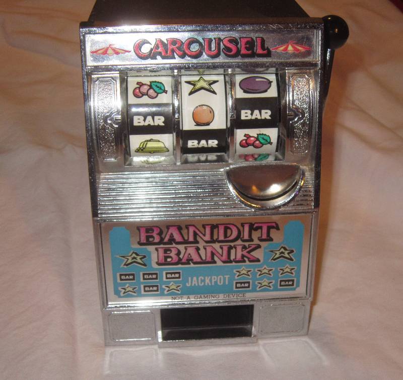 lot 22 image: Collectible Bandit Bank Carousel