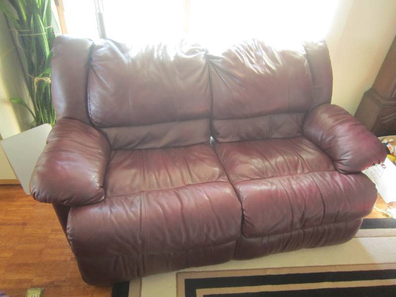 lot 102 image: Leather Loveseat