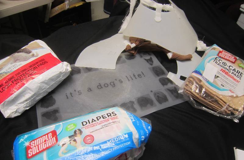 lot 144 image: LOT - Dog Supplies, Collars, Training Pads, Do Diapers, ETC