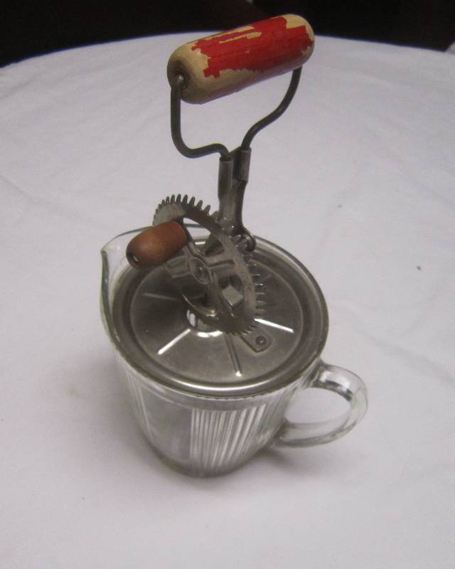 lot 154 image: Antique Beater Pitcher with Beater Red Handle