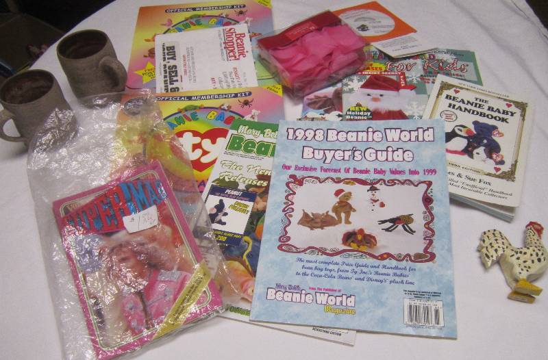 lot 171 image: Beanie Baby Books and Collectible Super Mag Magazines, Rooster and Mugs, ETC
