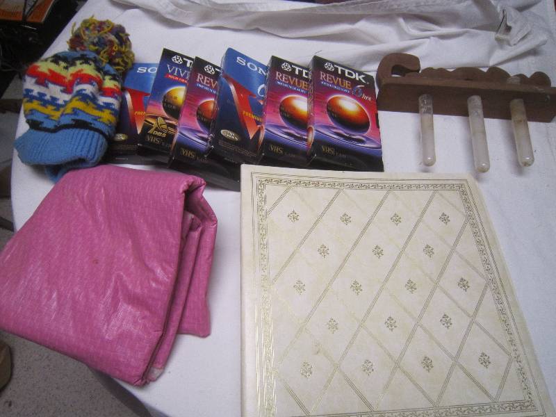 lot 232 image: Lot- New VHS, Photo Album, Hat, Tablecloth, Misc