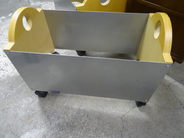 lot 56 image: Decorative File Hanger on Wheels