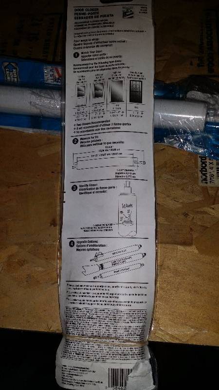 2 White Door Closers
