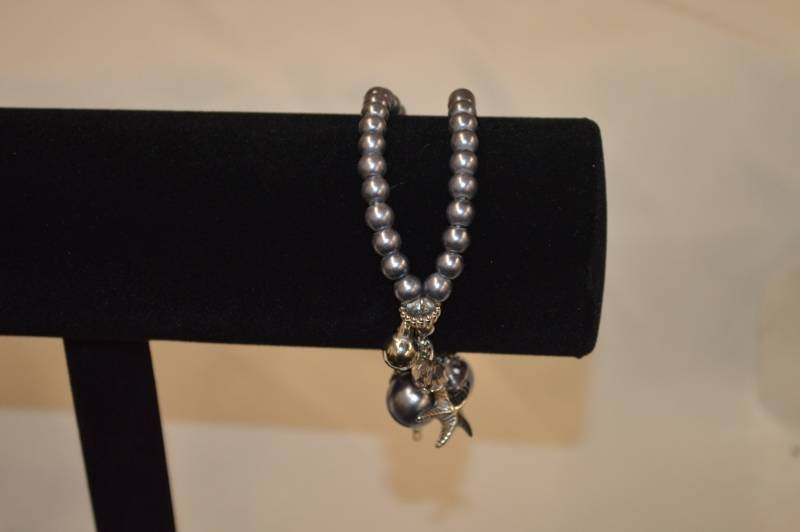 Bracelet - Cupid and Star fish charm