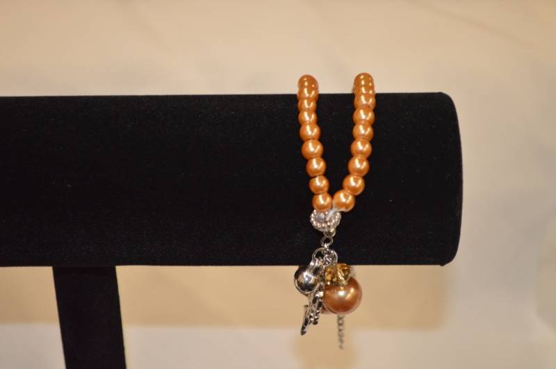 Bracelet - Cupid and Star fish charm