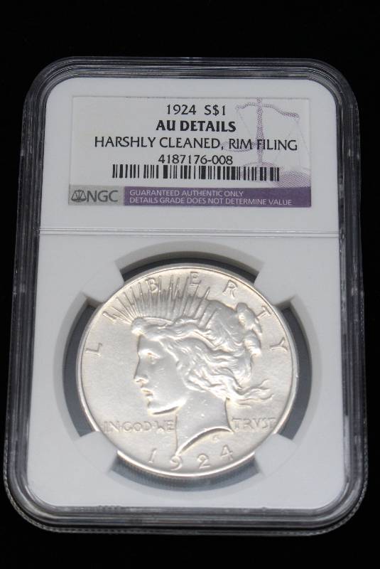 1924 Peace Dollar NGC AU Details wCleaning