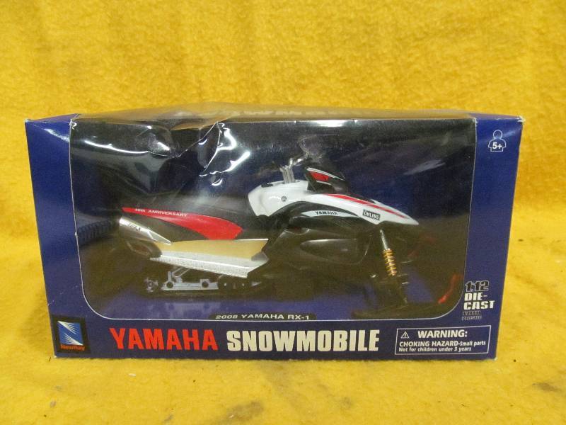 lot 15 image: toy snowmoblie