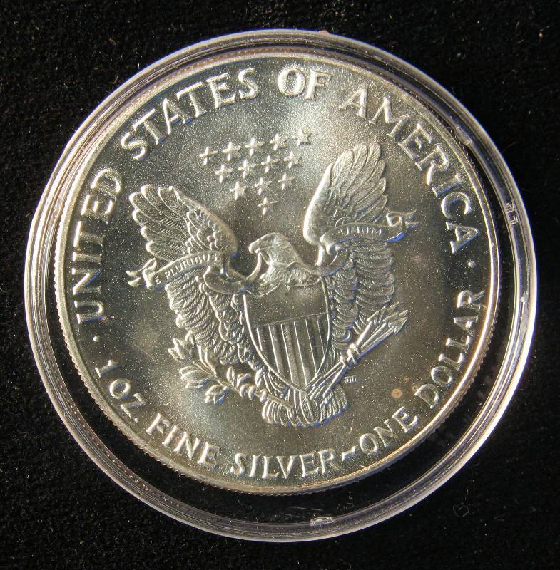 1987 AMERICAN SILVER EAGLE 1 TROY OZ. .999 FINE SILVER DOLLAR IN AIRTITE CAPSULE