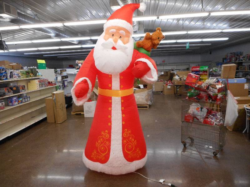 lot 1 image: HOME ACCENTS 9 FOOT 6 INCH INFLATABLE SANTA