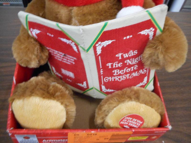 lot 10 image: HOME ACCENTS ANIMATED STORY TELLING BEAR