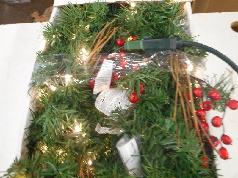 lot 15 image: 9 ft. Pre-Lit Hawkins Pine Artificial Garland with Clear Lights, Pinecones, Berries and