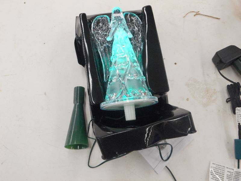 lot 16 image: Home Accents Holiday 8 inch LED Color Changing Crystal Angel Tree Topper