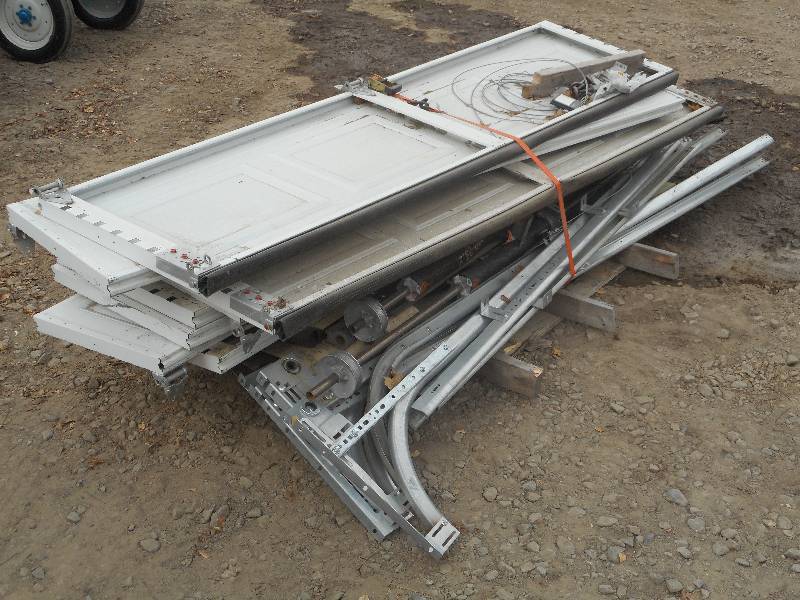 (2) 8ft Uninsulated Aluminum Garage...
