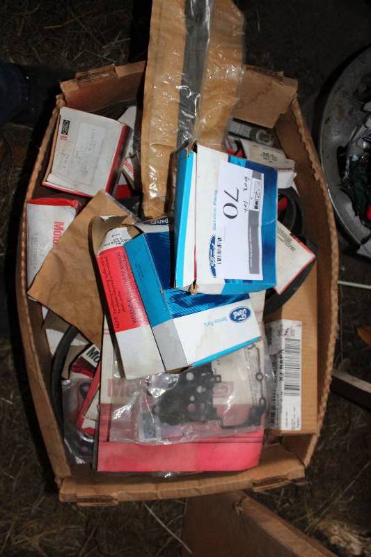 Box Lot of NewOld Stock Ford Parts  Valve w Gasket, Adapter and various car parts