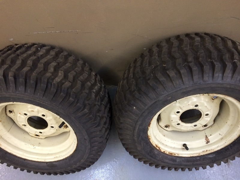 lot 74 image: Tires (2) Sears 23 x 9.50 - 12  2 ply rating