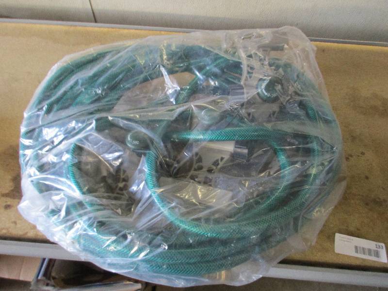 Hose with sprinkler