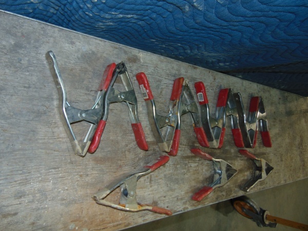 lot 18 image: (11) 3 Red Handle Clamps