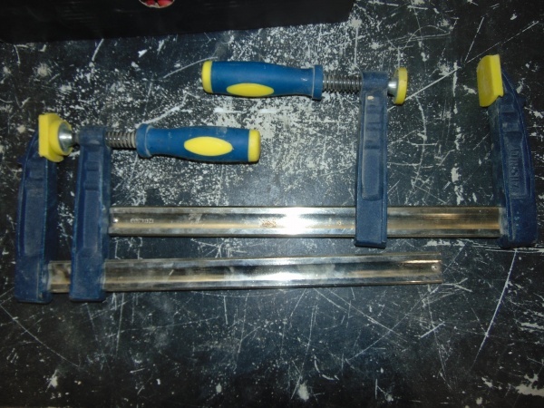 lot 31 image: (2) Wood Clamps Blue