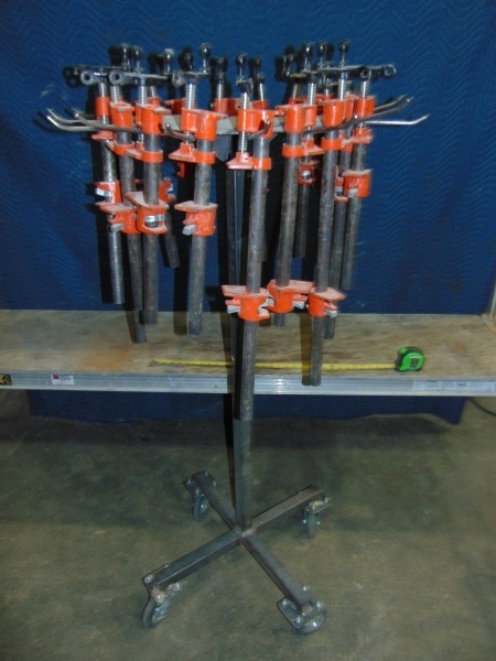 lot 40 image: (17) Wood Clamps with Metal Stand