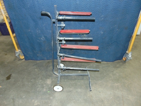 lot 56 image: Paper Dispenser on Wheels