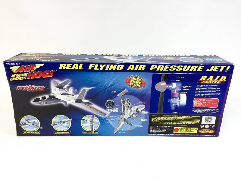 lot 5 image: Air Hogs Real Flying Air Pressure Jet -- 130 scale -- includes docking station & pump -- New in Box -- Makes a great Gift