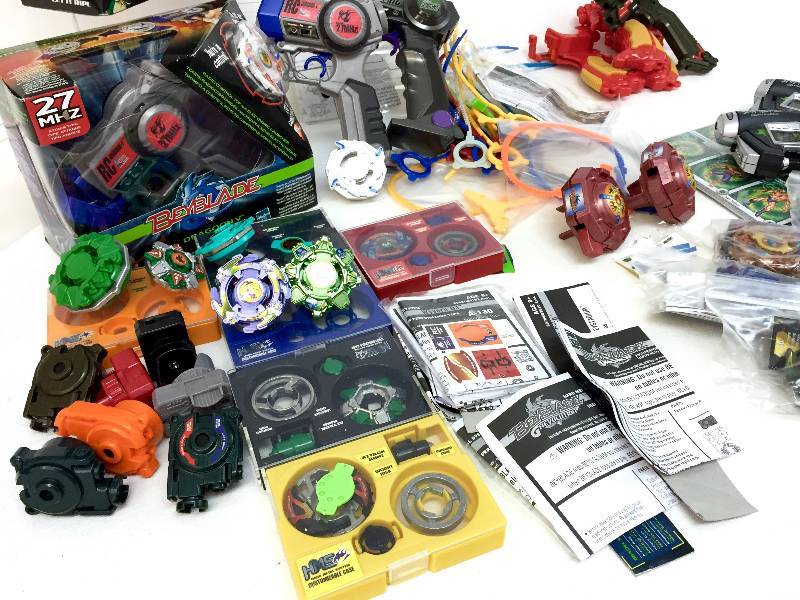 lot 10 image: Massive Collection of Beyblades