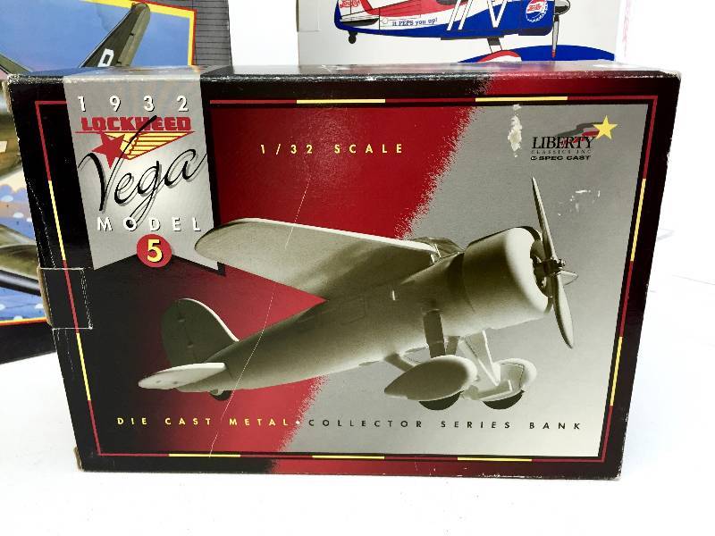 lot 11 image: Two Coin Banks & C-47 Skytrain Model Kit -- All New in Box