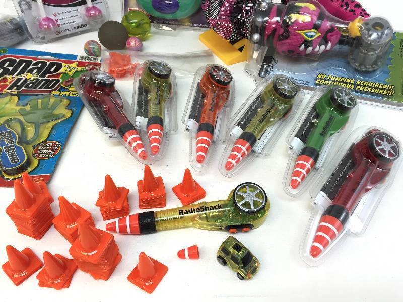 lot 18 image: Massive Lot of  New In Packaging  Toys -- Including Radio Shack Mini RC Car Pens
