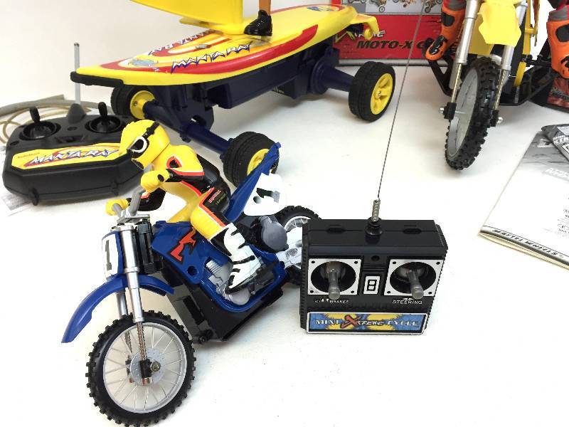 lot 19 image: 3 Tyco Rc Toys - Motorcycles & Sail Boat