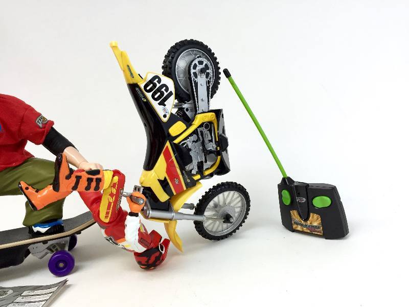 lot 20 image: 2 Tyco RC Toys Motor Cycle & Tony Hawke
