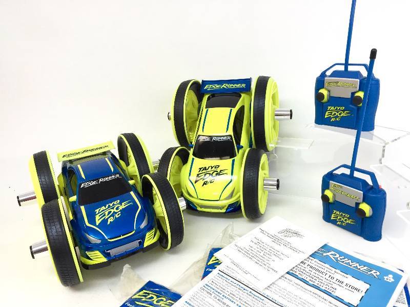 lot 30 image: 2 RC Edge Runner Cars -- New w Instructions & Decals