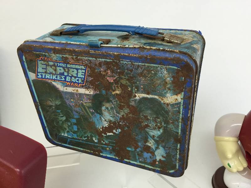 lot 35 image: Collectibles M&M Banks, Vintage Star Wars Lunch Box, Model Robots in Boxes,  Wahl Hair Cutting Kit