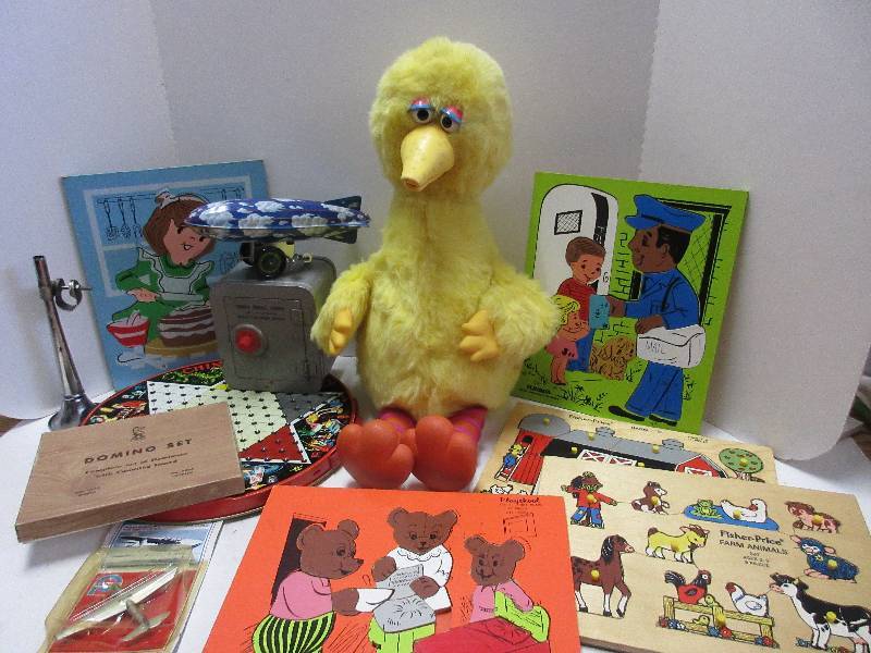 A few more Toys Talking Big Bird, Wood Puzzles, Safe Bank, & Games