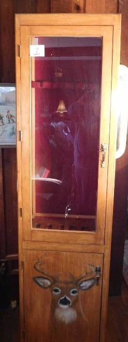 lot 1 image: Cabinet converted into a gun cabinet hand painted deer on door by owner